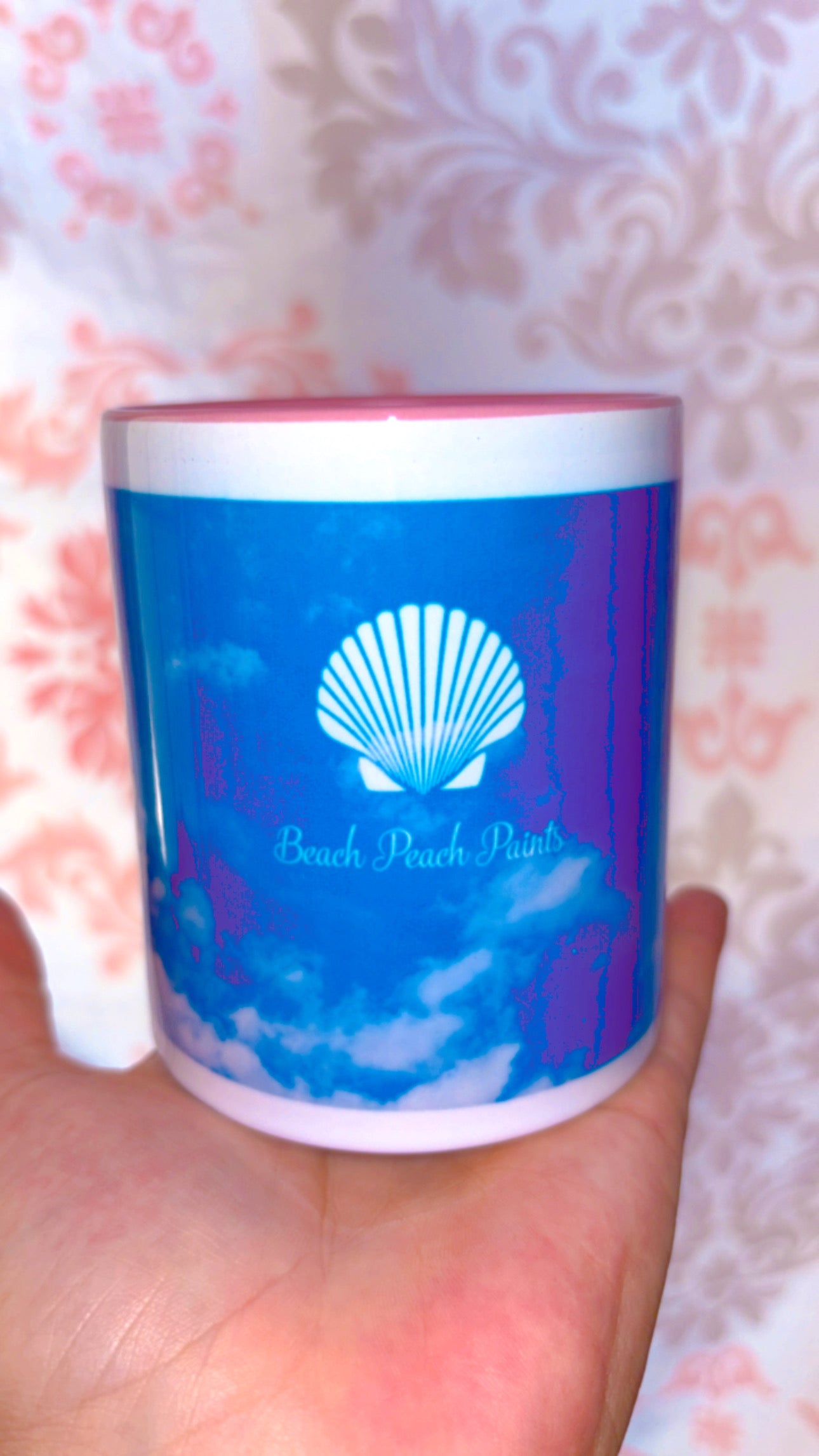 Pink disco cherries with flowers on a sky blue background with pink handle and inside